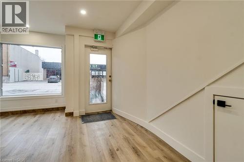 Entryway with wood finished floors and recessed lighting - 18 Barton Street E Unit# A, Hamilton, ON 