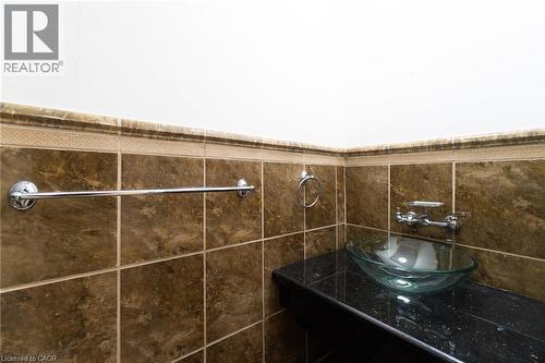 Bathroom featuring vanity - 18 Barton Street E Unit# A, Hamilton, ON 
