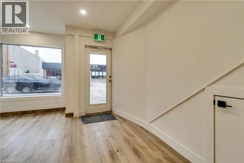 Entryway with wood finished floors and recessed lighting - 18 Barton Street E Unit# A, Hamilton, ON 
