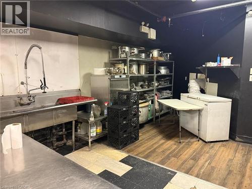 Bar with white fridge - 179 King Street W, Kitchener, ON 