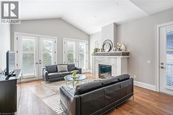 Open concept Living Room with multiple walk outs - 