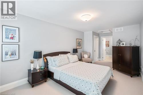 Upper Bedroom suite #2 with ensuite bath and walk-in closets - 507 Mississagua Street, Niagara-On-The-Lake, ON - Indoor Photo Showing Bedroom