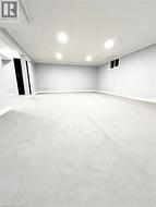 Finished basement featuring baseboards - 