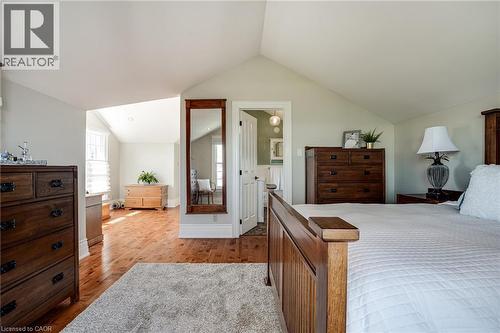Bedroom featuring lofted ceiling and light wood-style flooring - 849 Beach Boulevard, Hamilton, ON - Indoor Photo Showing Bedroom