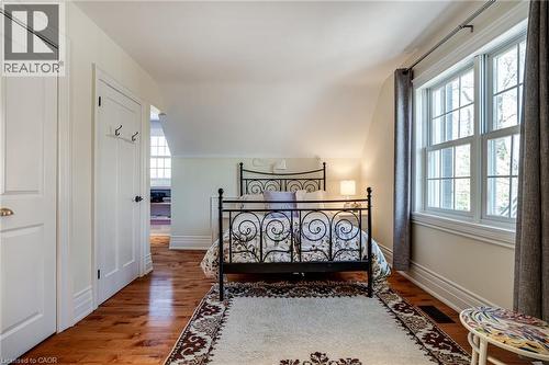 Bedroom #3 featuring lofted ceiling and wood-type flooring - 849 Beach Boulevard, Hamilton, ON - Indoor Photo Showing Bedroom