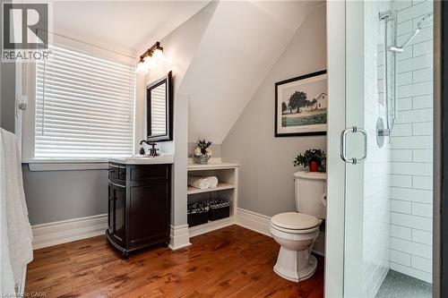 Full bathroom with vanity, a shower stall, lofted ceiling, and dark wood finished floors - 849 Beach Boulevard, Hamilton, ON - Indoor Photo Showing Bathroom