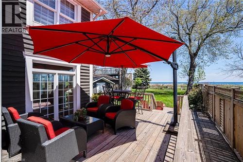 Wooden terrace featuring outdoor lounge area and outdoor dining space - 849 Beach Boulevard, Hamilton, ON - Outdoor With Deck Patio Veranda