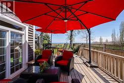 Deck with an outdoor living space - 