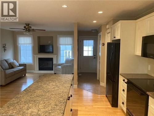 22 Gordon Road, Tiny, ON - Indoor Photo Showing Living Room With Fireplace