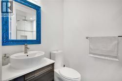 Full bath with vanity and a shower - 