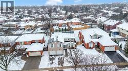 Snowy aerial view with a residential view - 