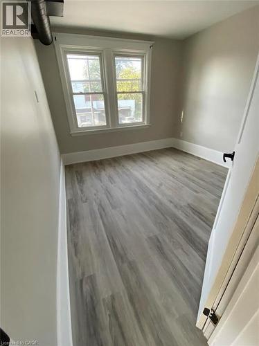 Spare room featuring light wood-style flooring and baseboards - 193 Balmoral Avenue N, Hamilton, ON - Indoor Photo Showing Other Room