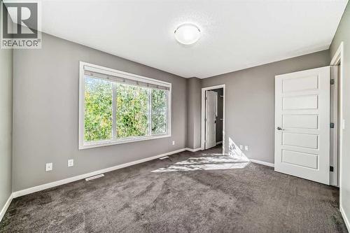 238 Panatella  Nw, Calgary, AB - Indoor Photo Showing Other Room