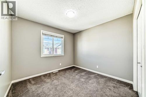 238 Panatella  Nw, Calgary, AB - Indoor Photo Showing Other Room