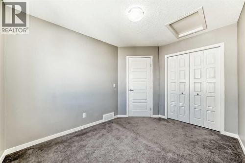 238 Panatella  Nw, Calgary, AB - Indoor Photo Showing Other Room