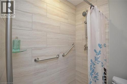 Bathroom featuring a stall shower and toilet - 41 Sister Kern Terrace, Hamilton, ON - Indoor Photo Showing Bathroom