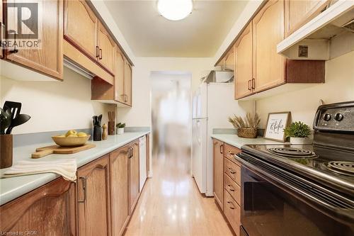 Virtually Staged - 465 Woolwich Street N Unit# 17, Waterloo, ON - Indoor Photo Showing Kitchen