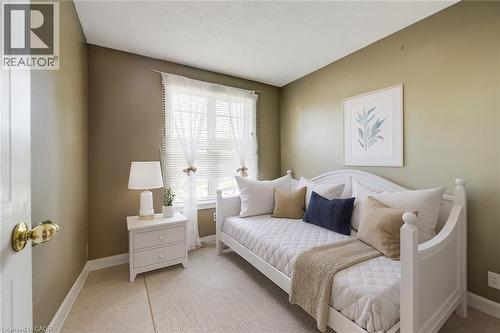 Virtually Staged - 465 Woolwich Street N Unit# 17, Waterloo, ON - Indoor Photo Showing Bedroom