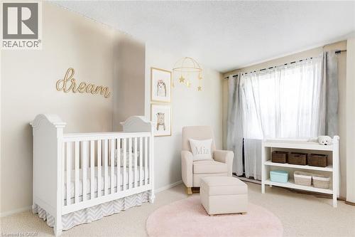 Virtually Staged - 465 Woolwich Street N Unit# 17, Waterloo, ON - Indoor Photo Showing Bedroom