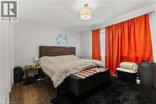 Bedroom with dark wood-style floors - 557 Lake Street, St. Catharines, ON - Indoor Photo Showing Bedroom