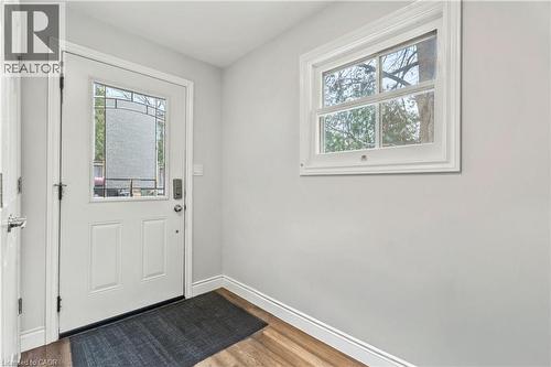 Entryway with baseboards and wood finished floors - 557 Lake Street, St. Catharines, ON - Indoor Photo Showing Other Room