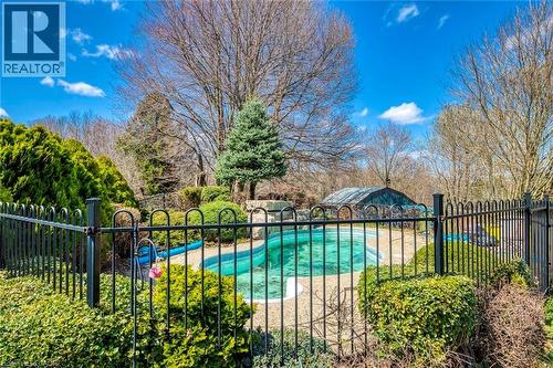 View of swimming pool featuring fence and a fenced in pool - 1215 Britannia Road, Burlington, ON 