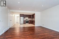 Unfurnished living room with recessed lighting and light wood finished floors - 