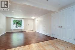 Foyer entrance with recessed lighting and light wood finished floors - 