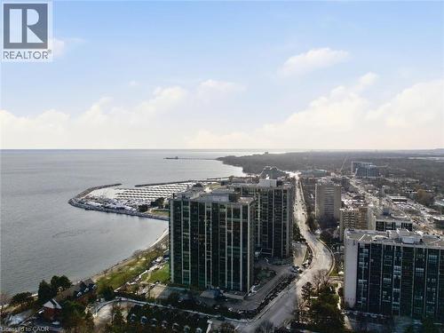 Aerial view of property's location featuring nearby urban area and a large body of water - 2170 Marine Drive Unit# 1808, Oakville, ON - Outdoor With Body Of Water With View