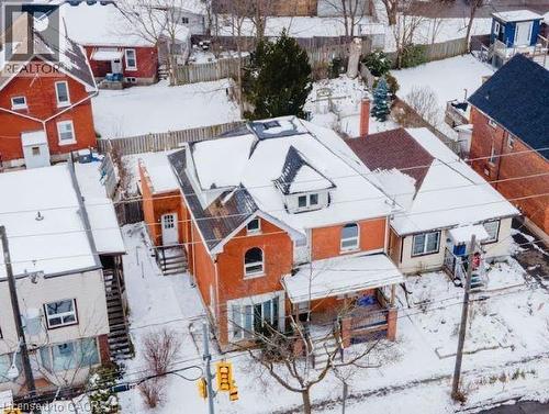 Snowy aerial view featuring a residential view - 219 Erie Avenue, Brantford, ON - Outdoor