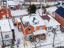Snowy aerial view featuring a residential view - 219 Erie Avenue, Brantford, ON  - Outdoor 