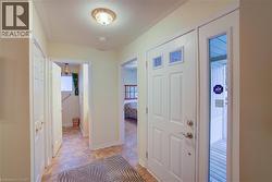 Entryway with stone finish flooring and a textured ceiling - 