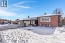 Raised Bungalow featuring brick siding, a chimney, and a garage - 136 Limpert Avenue, Cambridge, ON  - Outdoor 