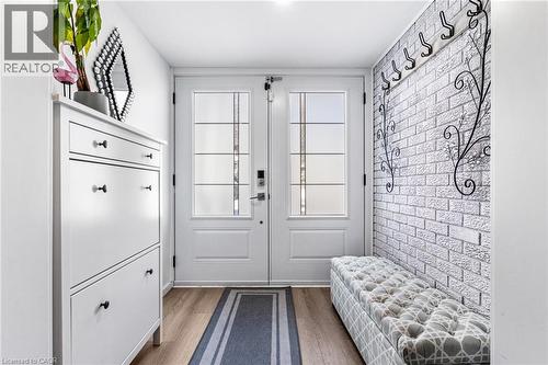 Entryway featuring wood finished floors - 136 Limpert Avenue, Cambridge, ON - Indoor Photo Showing Other Room