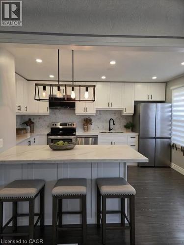Virtually Staged - 373 East 27Th Street, Hamilton, ON - Indoor Photo Showing Kitchen With Upgraded Kitchen