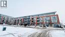 Snow covered property with a view of apartment building / complex - 155 St. Leger Unit# 107, Kitchener, ON  - Outdoor 