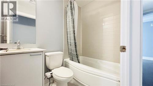 Bathroom with vanity and shower / tub combo - 155 St. Leger Unit# 107, Kitchener, ON - Indoor Photo Showing Bathroom