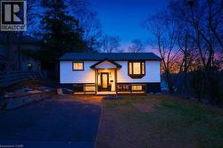 Split foyer home featuring a deck - 