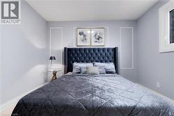 Bedroom featuring baseboards - 