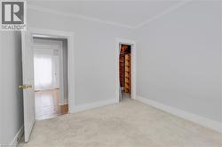 Spare bedroom or office space with walk-in cedar closet - 