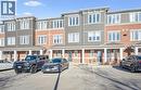 View of property featuring uncovered parking and a residential view - 24 Morrison Road Unit# D9, Kitchener, ON  -  Photo Showing Garage 