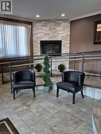 Common area with crown molding and recessed lighting - 