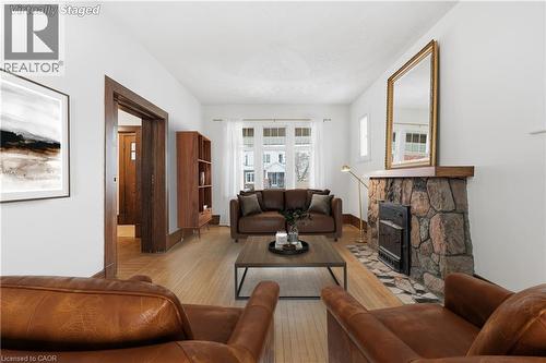 110 Houghton Avenue S, Hamilton, ON - Indoor Photo Showing Living Room With Fireplace