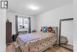 Bedroom featuring light wood-style floors - 