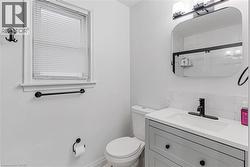 Bathroom with a stall shower and vanity - 