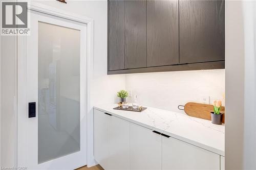 Bar with decorative backsplash and wet bar - 151C Port Robinson Road, Pelham, ON - Indoor Photo Showing Other Room