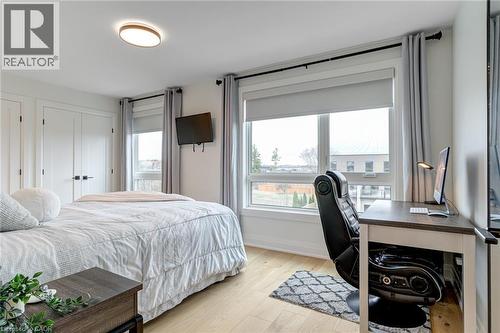 Bedroom featuring light wood-style floors and baseboards - 151C Port Robinson Road, Pelham, ON - Indoor Photo Showing Bedroom