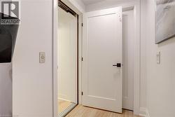 Bathroom featuring wood finished floors - 