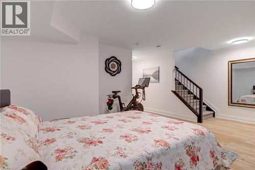 Bedroom featuring baseboards and wood finished floors - 151C Port Robinson Road, Pelham, ON - Indoor Photo Showing Bedroom