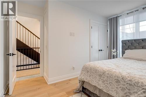 Bedroom with a closet, baseboards, and light wood-style floors - 151C Port Robinson Road, Pelham, ON - Indoor Photo Showing Bedroom